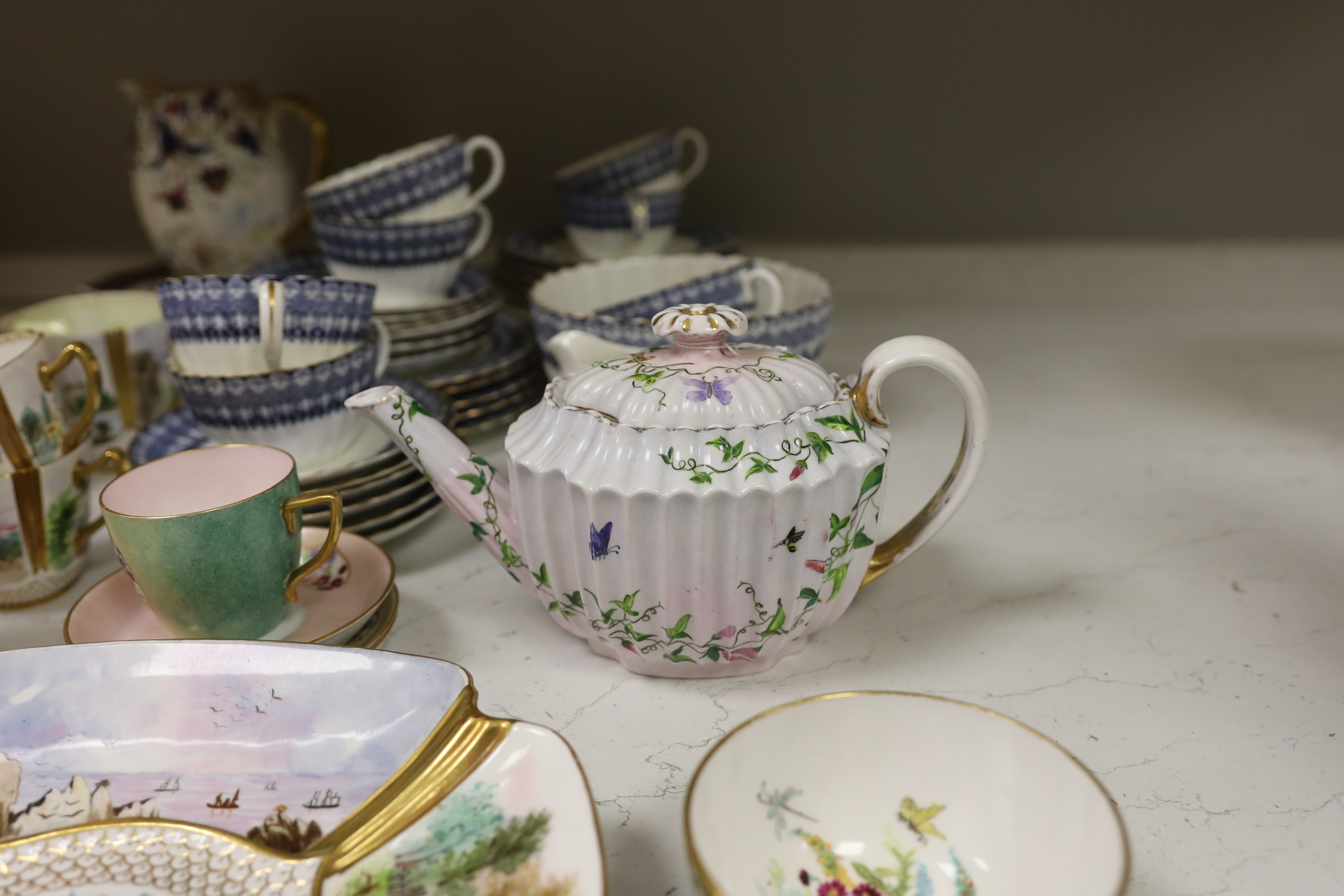 A Copeland Spode porcelain part tea set and two dishes, painted with scenes after Birkett Foster, a blue and white teaset and other teaware, Copeland Spode dishes 25cm wide